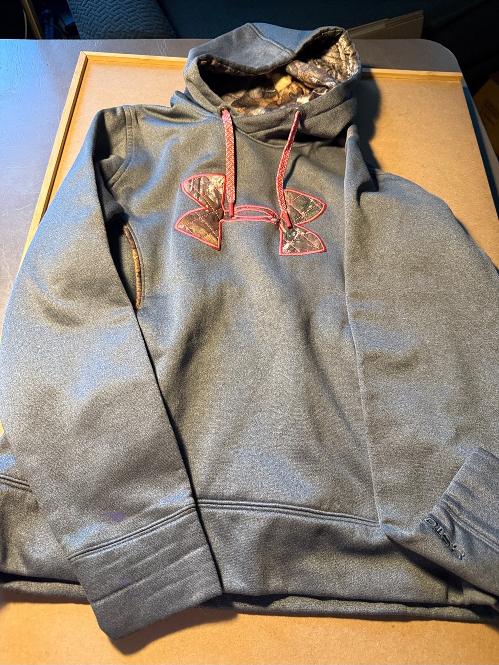 Under Armour Gray Hoodie with Camo Logo and Pink Trim. This is a small petite.